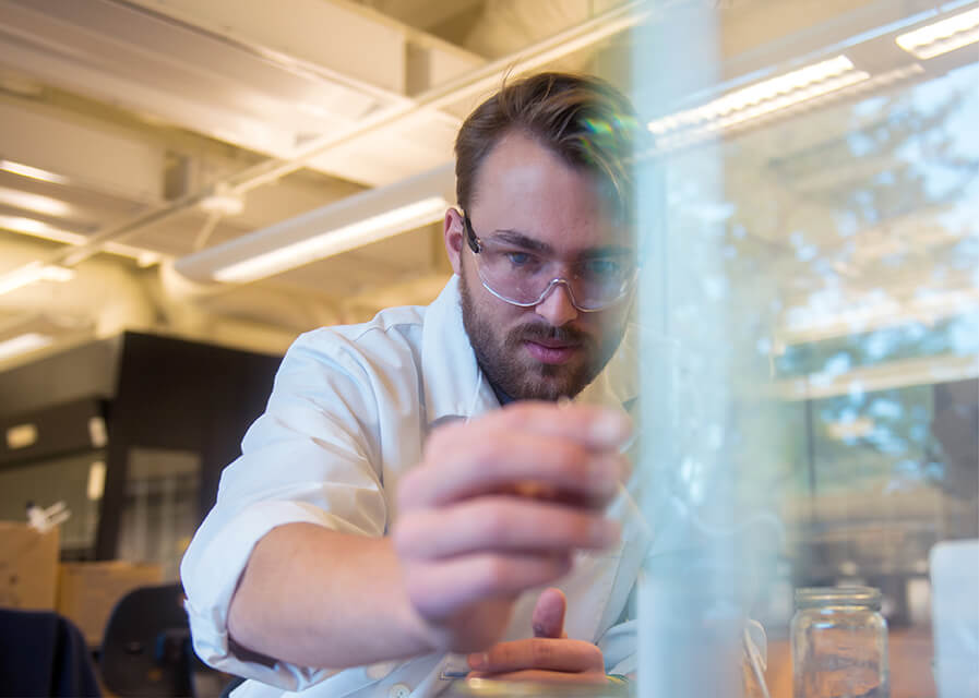 A student works in a science lab.