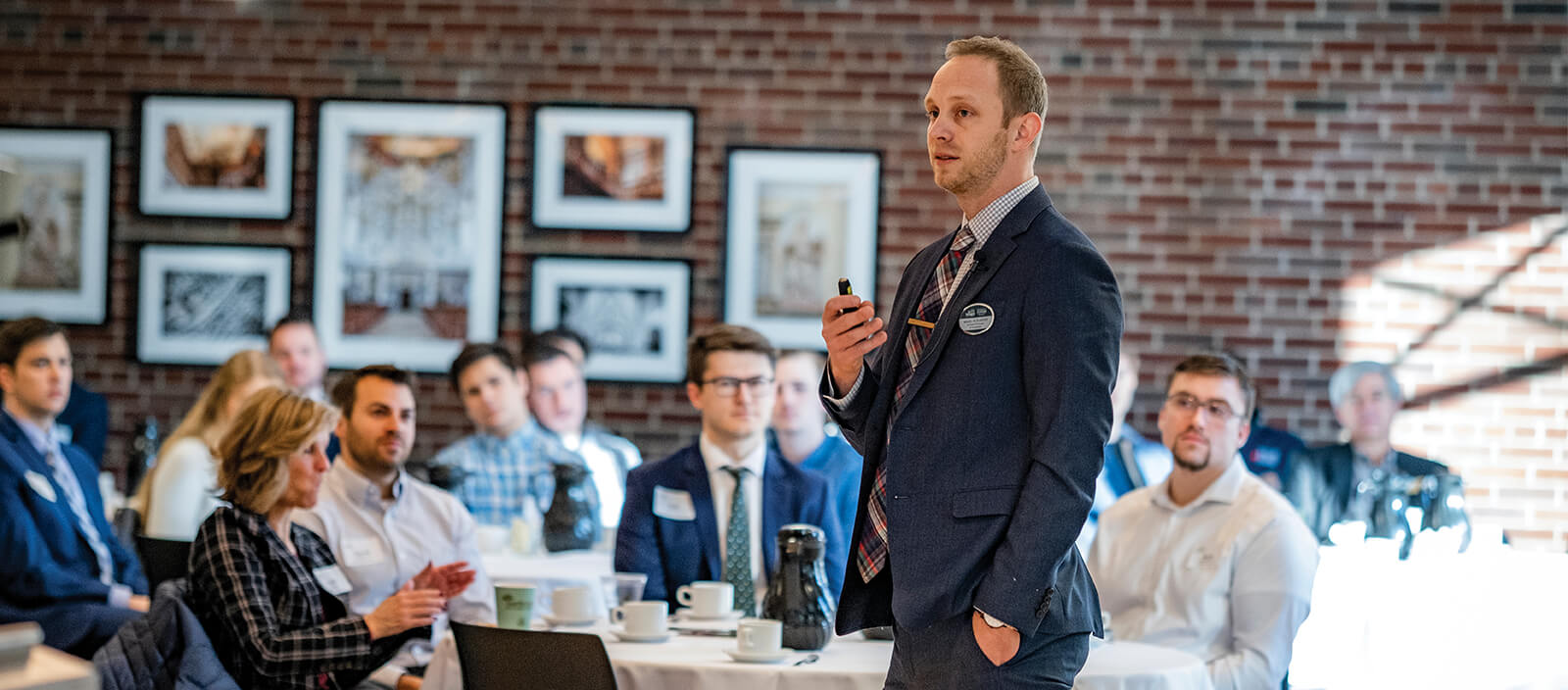 St. Norbert College professor presents to area business leaders.