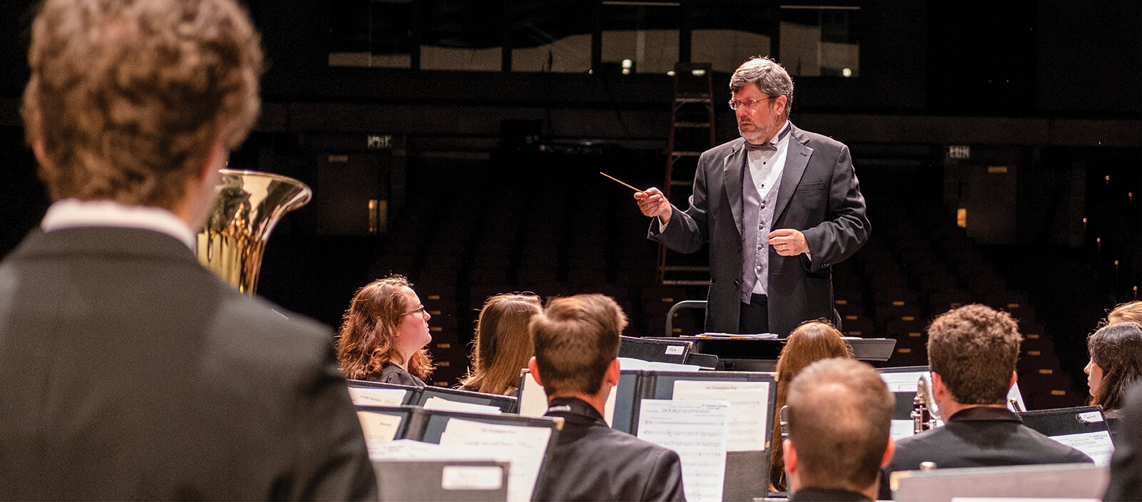 Professor Phillip Klickman conducting a student group