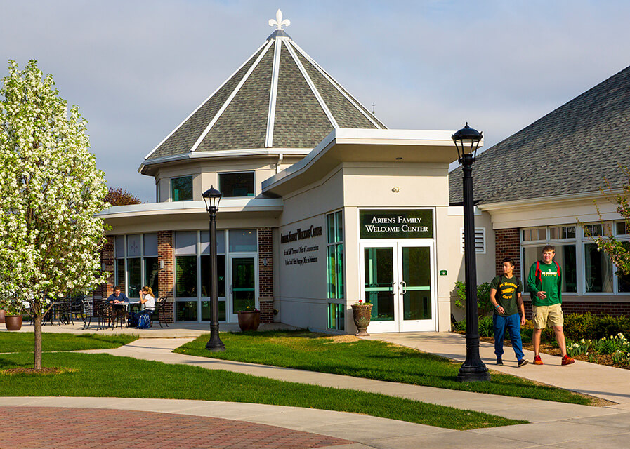 Students coming out of Ariens welcome center