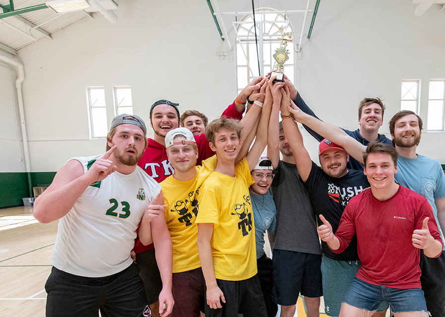 Sports team lifting a trophy